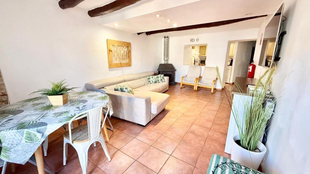 a living room with a couch and a table at Casa Rural NEREA in Letux
