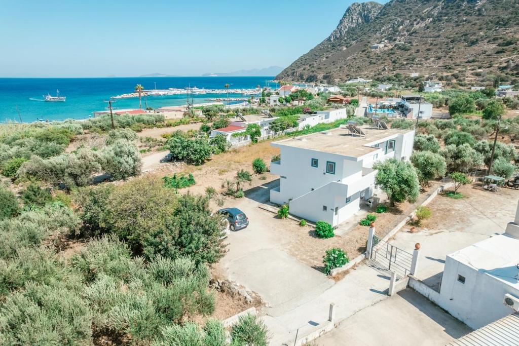 an aerial view of a house and the beach at Xenia's House in Kefalos