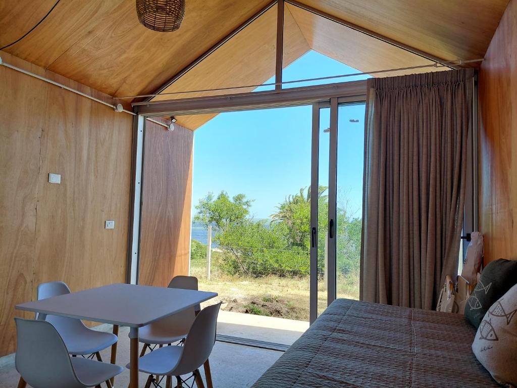 Alción Cabañas de Mar