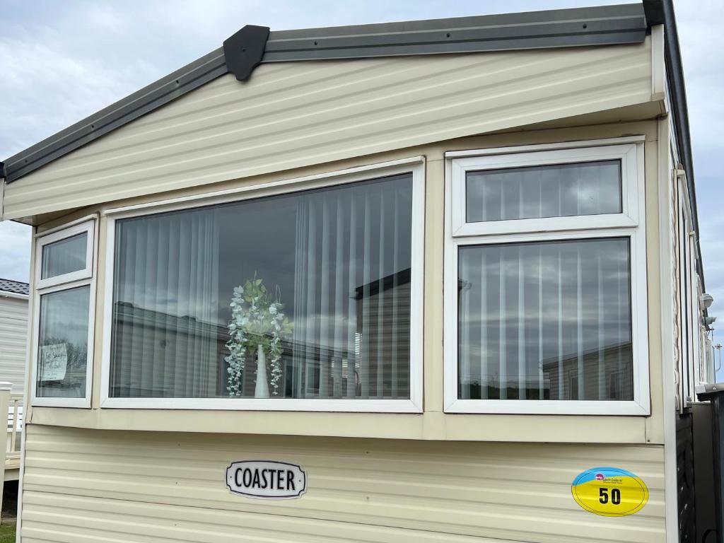 a screened in porch on a tiny house at 50 Seaview Ingoldmells in Ingoldmells
