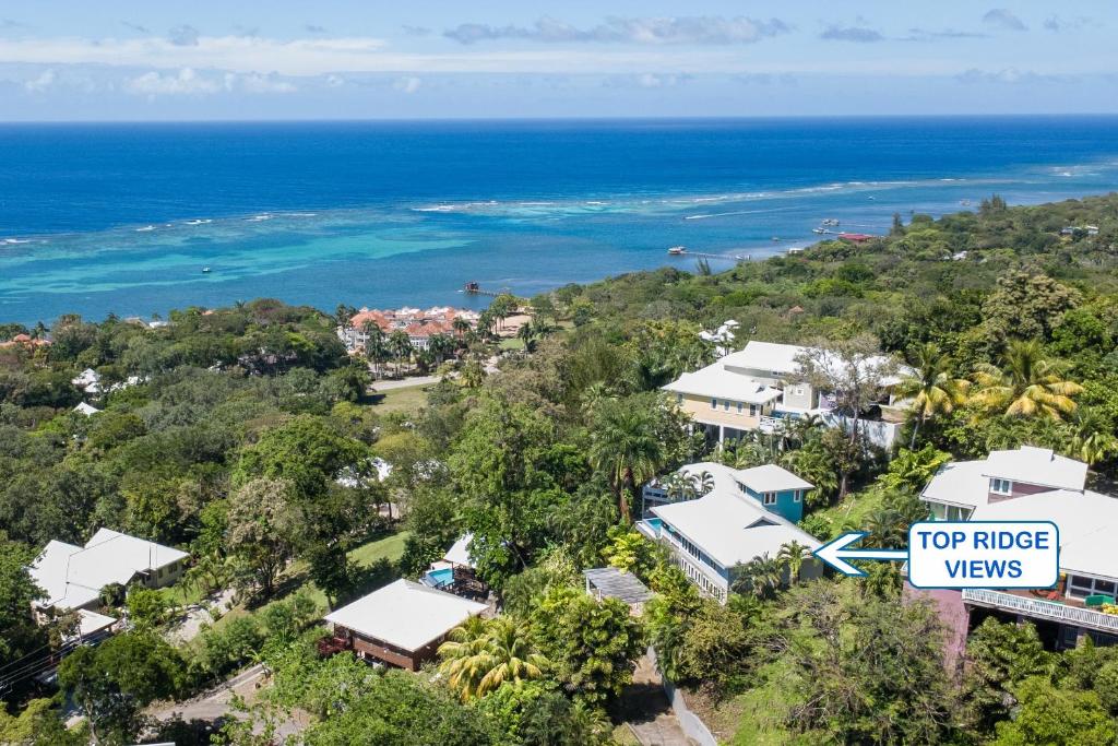 an aerial view of a resort with a top ridge views sign at Top Ridge Views home in Roatán