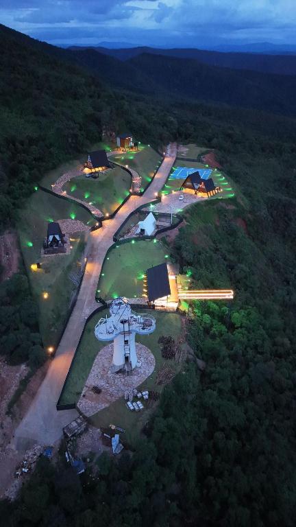 an aerial view of a golf course at night at Chalé A-Frame - Chalé de Cima in Ouro Preto