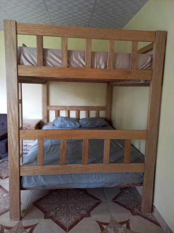 a bunk bed in a room at Volcán Barú Unique Studio Apartment in Nueva California