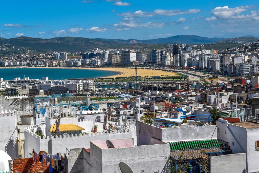 a view of a city from the fortress at CASA ADiL in Tangier