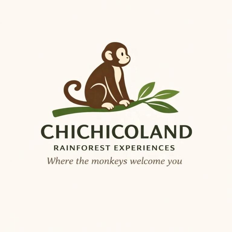 a monkey sitting on a leaf logo at Chichicoland in Tena