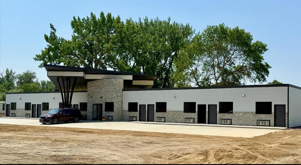 a building with a car parked in front of it at Airstay LLC in Clark