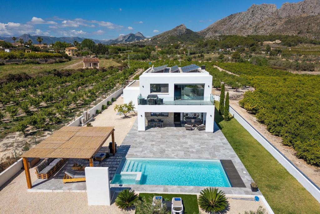 an aerial view of a villa with a swimming pool at Azahar Sun in Ondara