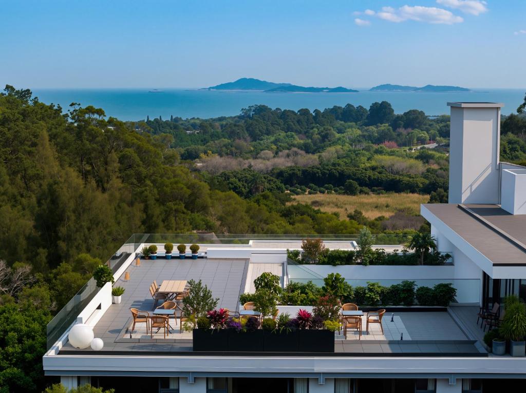 a view from the roof of a house with a patio at 微云隐舍 in Jiazaiwei