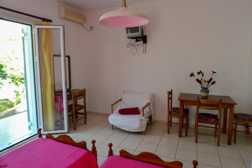 Postel nebo postele na pokoji v ubytování Cottage Sakkatos