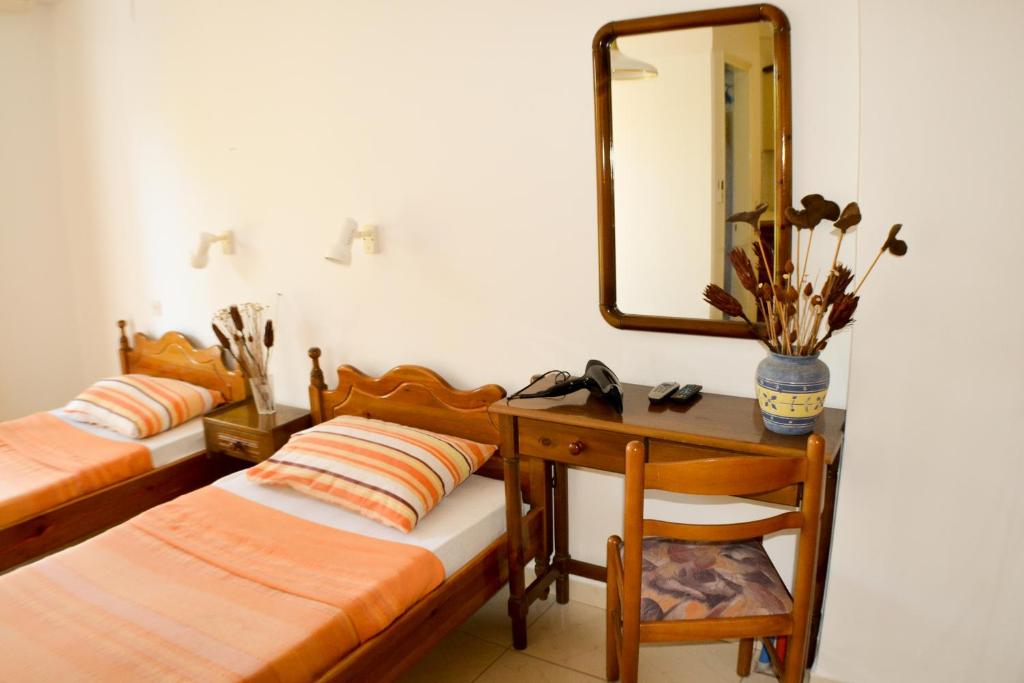 Postel nebo postele na pokoji v ubytování Cottage Sakkatos