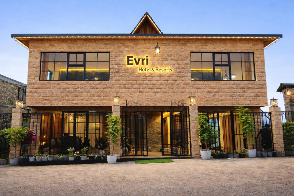 a brick building with an exithelial records sign on it at Evri Hotel & Resorts in Lava