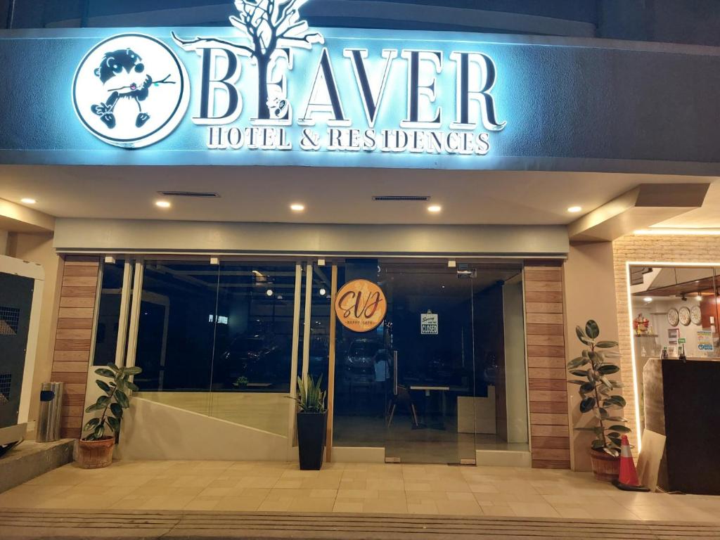 a sign that reads beaver hotel andres lodges at BEAVER HOTEL and RESIDENCES in Cebu City