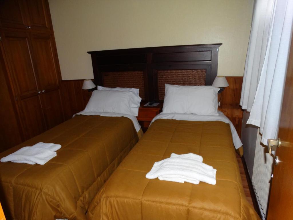 Postel nebo postele na pokoji v ubytování Hosteria La Pastorella