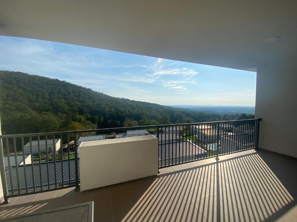 a balcony with a view of a mountain at Unin Apartman, Kosmaj Renew, Rogača in Rogača