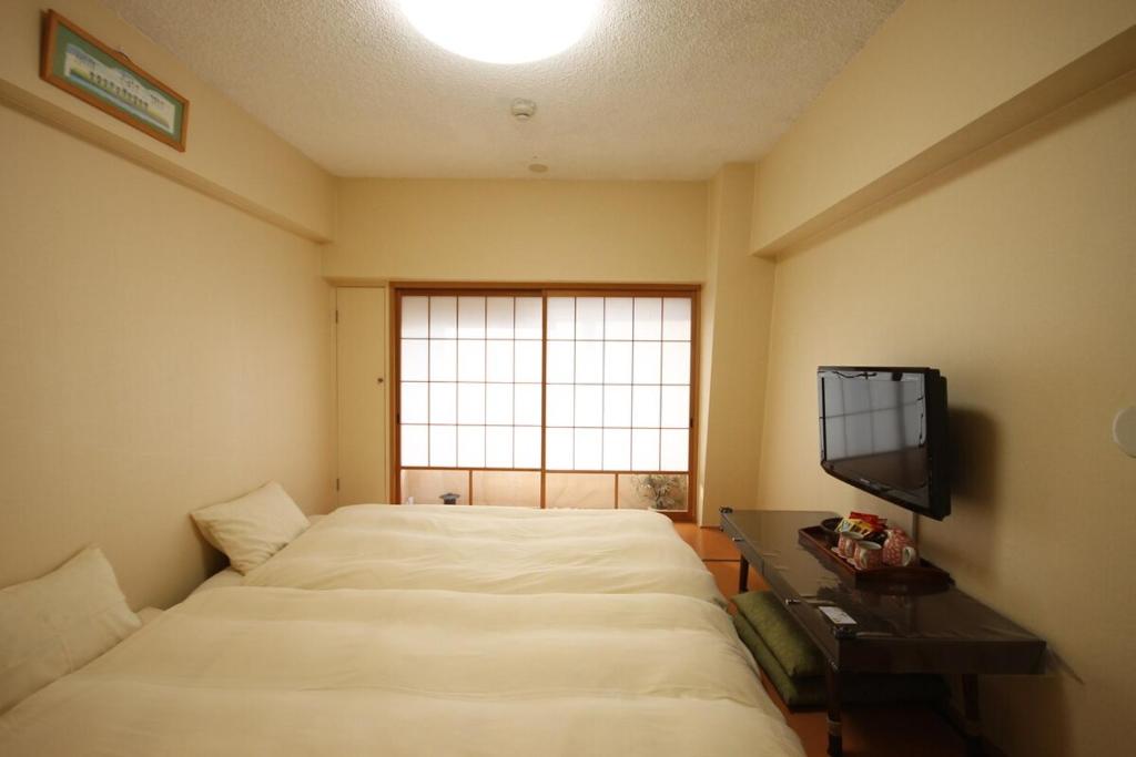 NAGAMORIYA 30 seconds walk from Shin-Osaka Station, free Wi-Fi, super convenient transportation access, J Type