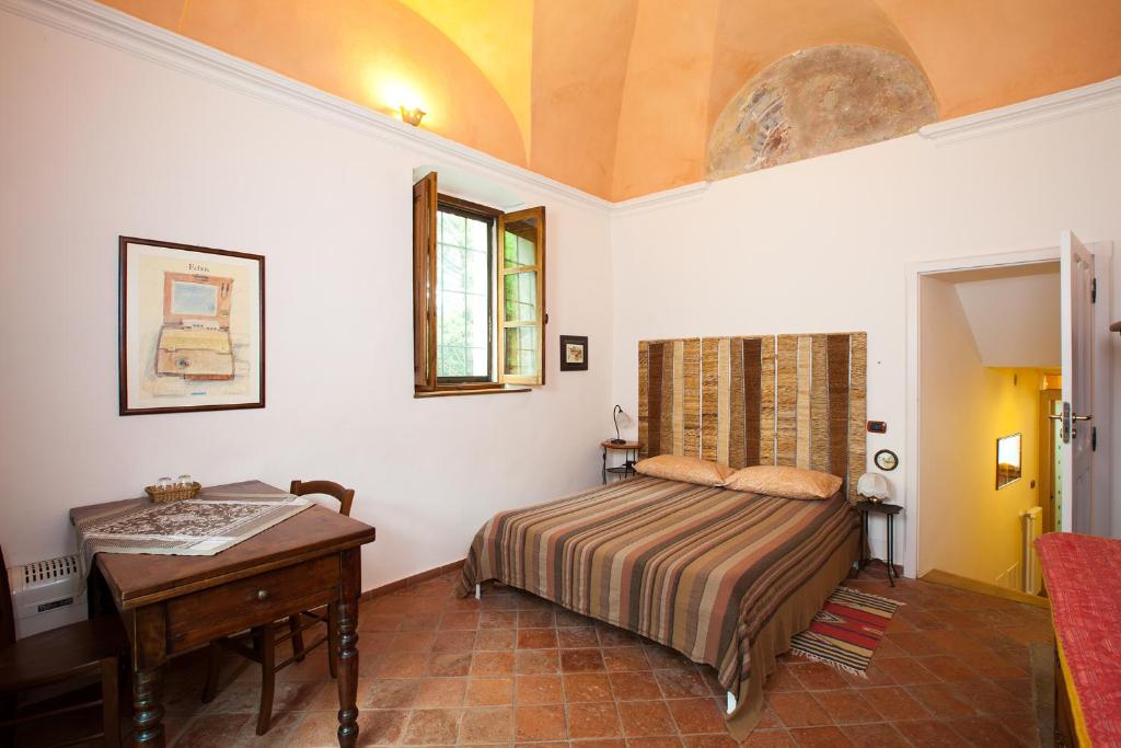 Postel nebo postele na pokoji v ubytování B&B Cascina Moncrava