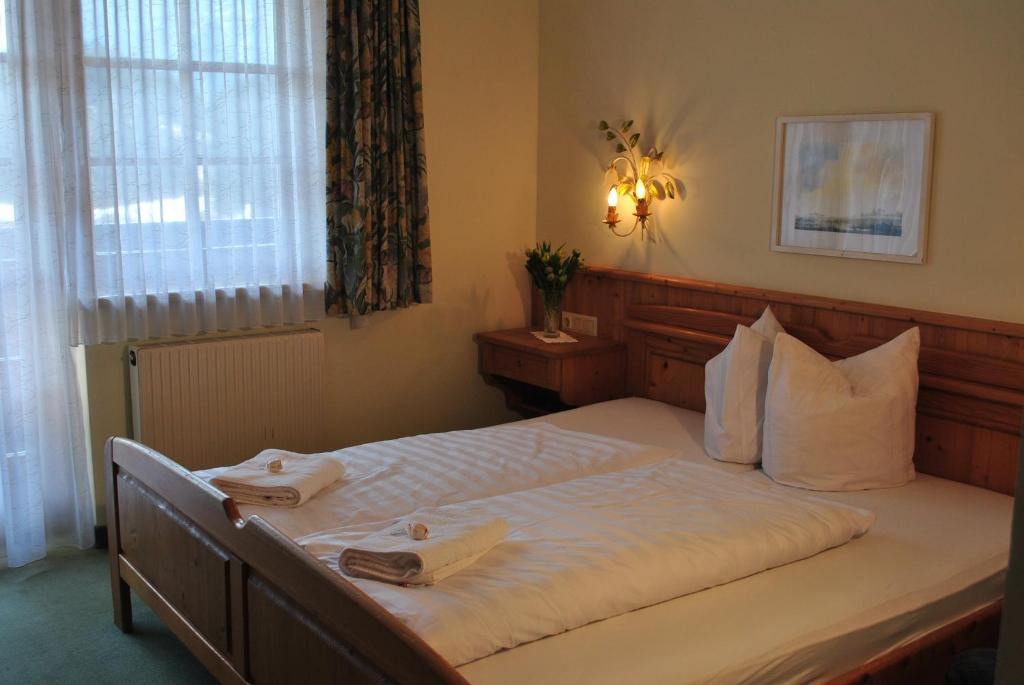 Postel nebo postele na pokoji v ubytování Hotel Tauplitzerhof