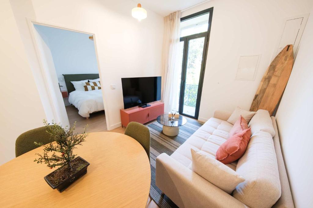 Les Suites du Parc - Appartement lumineux de 2 chambres avec une vue imprenable sur le parc Simone Veil à 2 minutes des halles