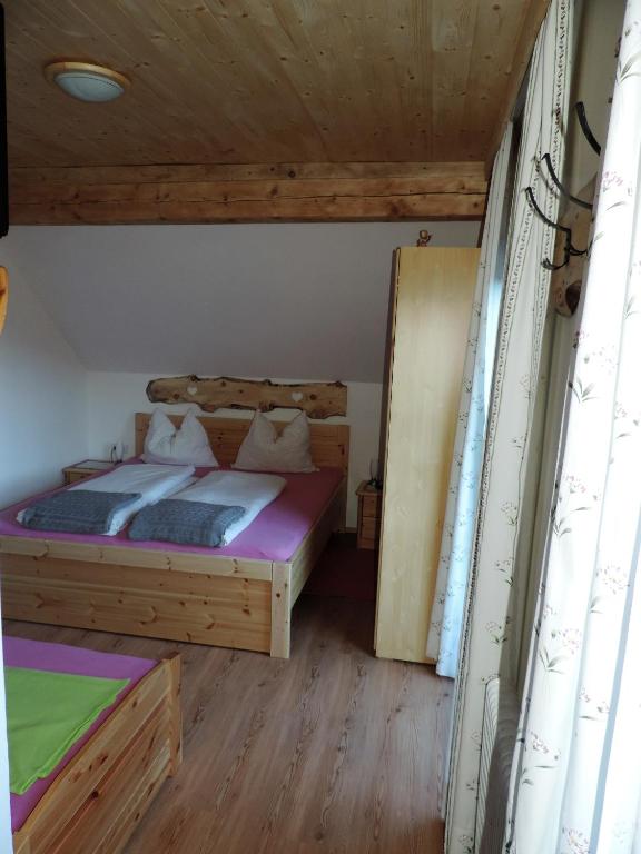 Postel nebo postele na pokoji v ubytování Unterlanschützhof