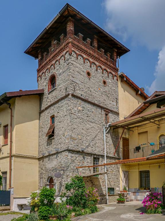 a building with a tower on the side of it at IL TORRINO in Golasecca