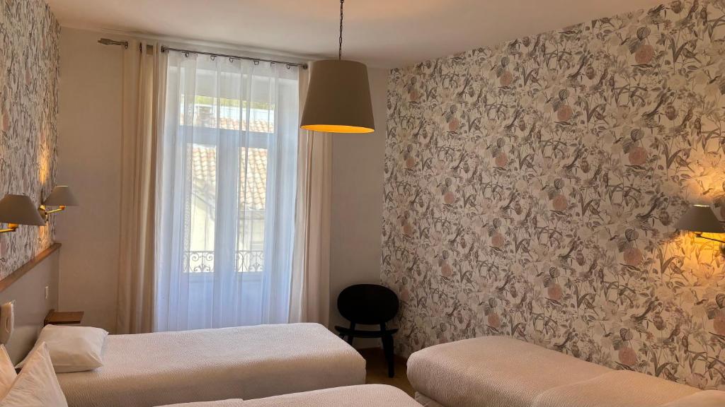 Logis Hôtel Restaurant Grand Hôtel de Lyon - 四人间
