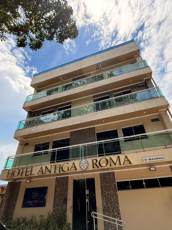 a building with the words hotel america roma on it at Hotel Antiga Roma in Belém