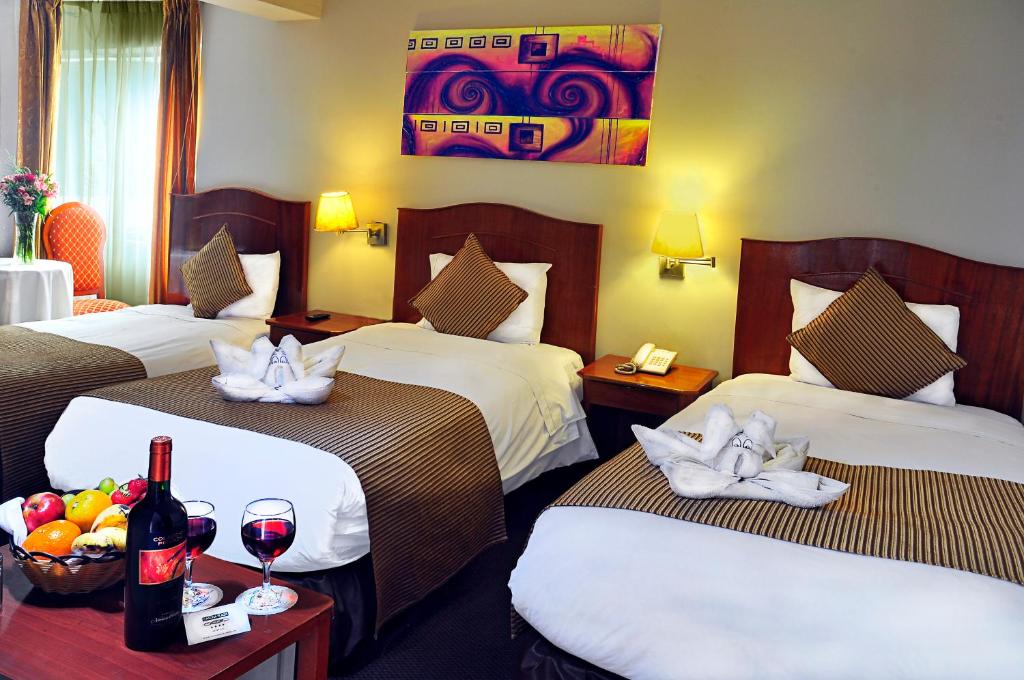 Postel nebo postele na pokoji v ubytování Casona Plaza Hotel Arequipa