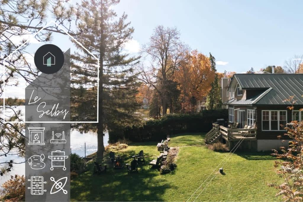 a house with a sign in front of it at Le Selby in Dunham