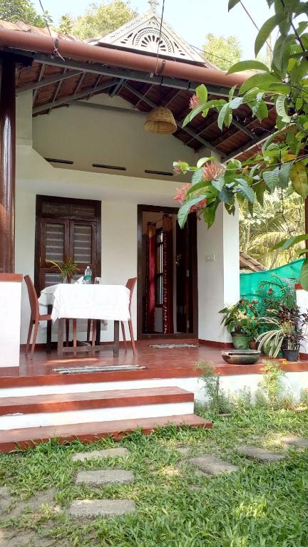 Zahrada ubytování Marari Umapathi Beach Villa