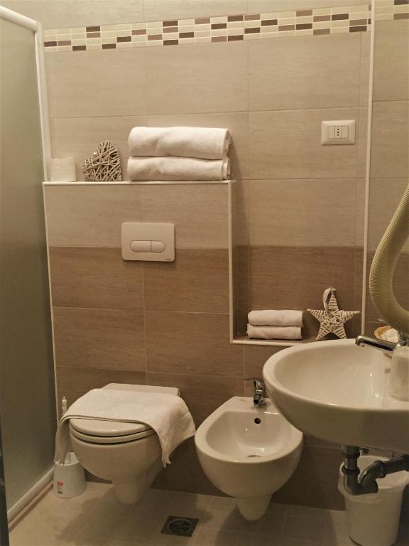 Koupelna v ubytování Abc Hotel