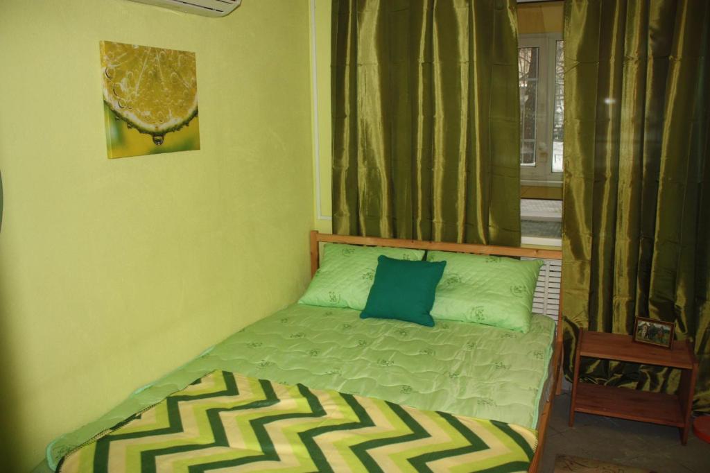 
Кровать или кровати в номере Len Inn Lux Hostel
