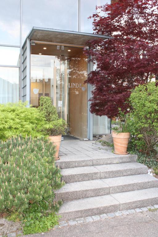 a set of stairs leading to a building at RB Hotel Linde in Wangen