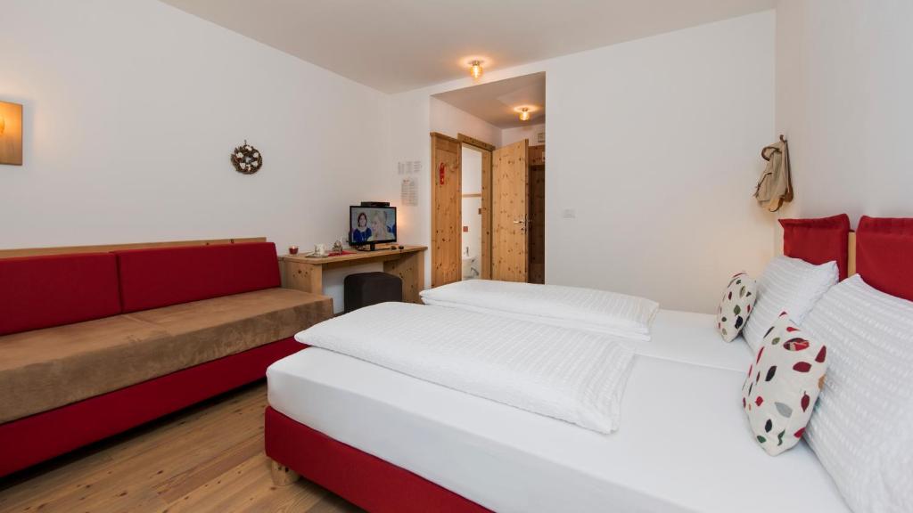 Postel nebo postele na pokoji v ubytování Small & Lovely Hotel Zaluna