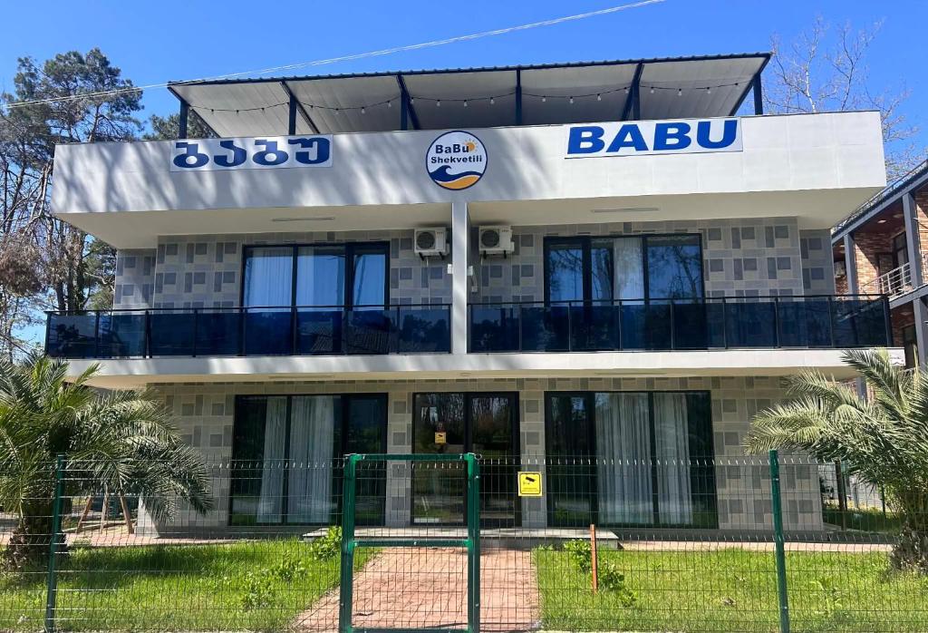 a building with a bula sign on top of it at BaBu shekvetili in Shekhvetili