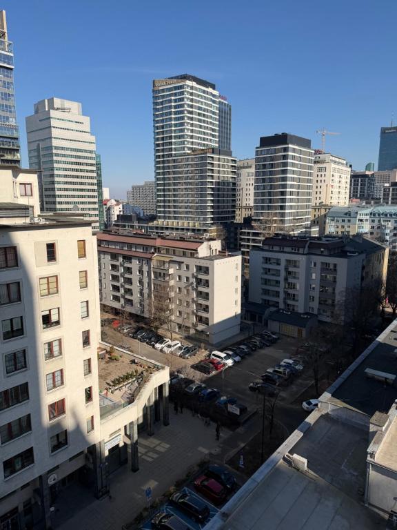 an aerial view of a city with tall buildings at Łucka 15 Sweet Home in Warsaw