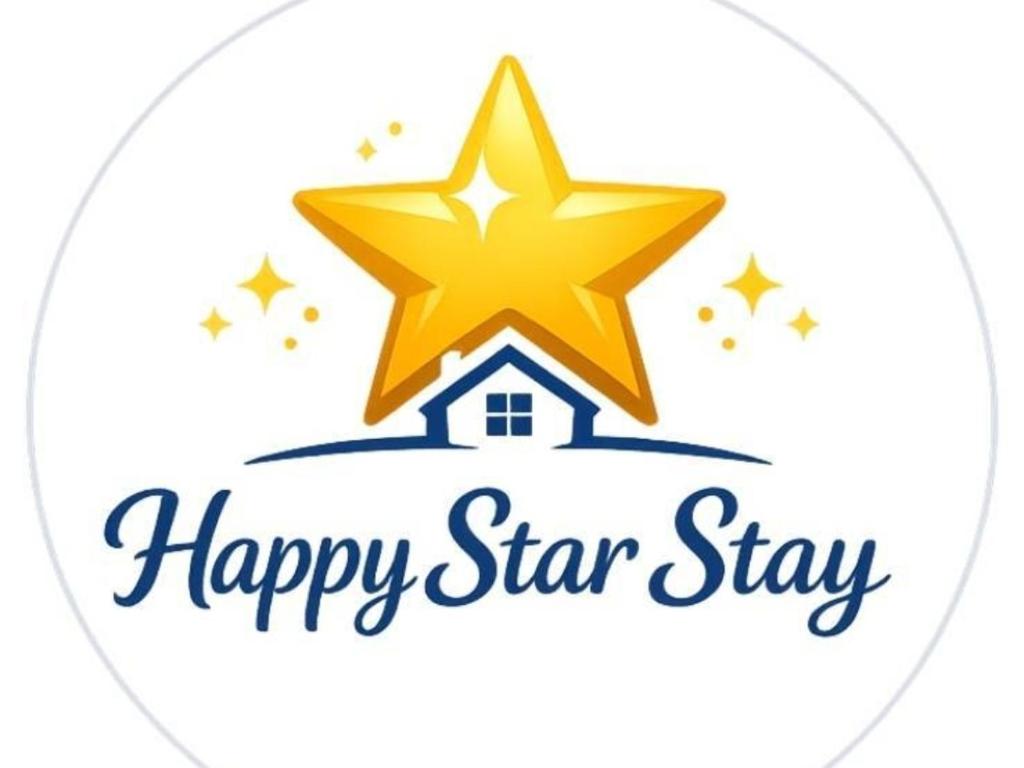 a star logo for a happy star stay at happy star stay in Sheki