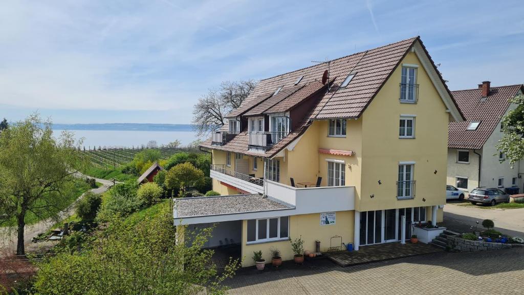 a house with a view of the ocean at Harlacher-Mühle in Stetten