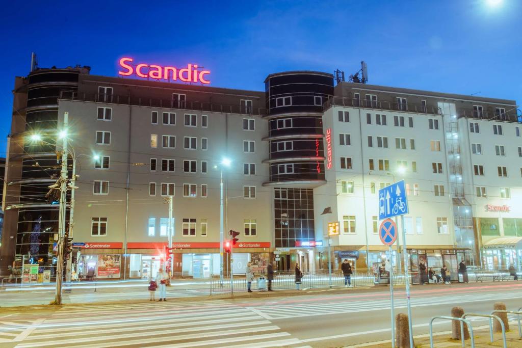 a building with a sign that reads scramble at Scandic Wrocław in Wrocław