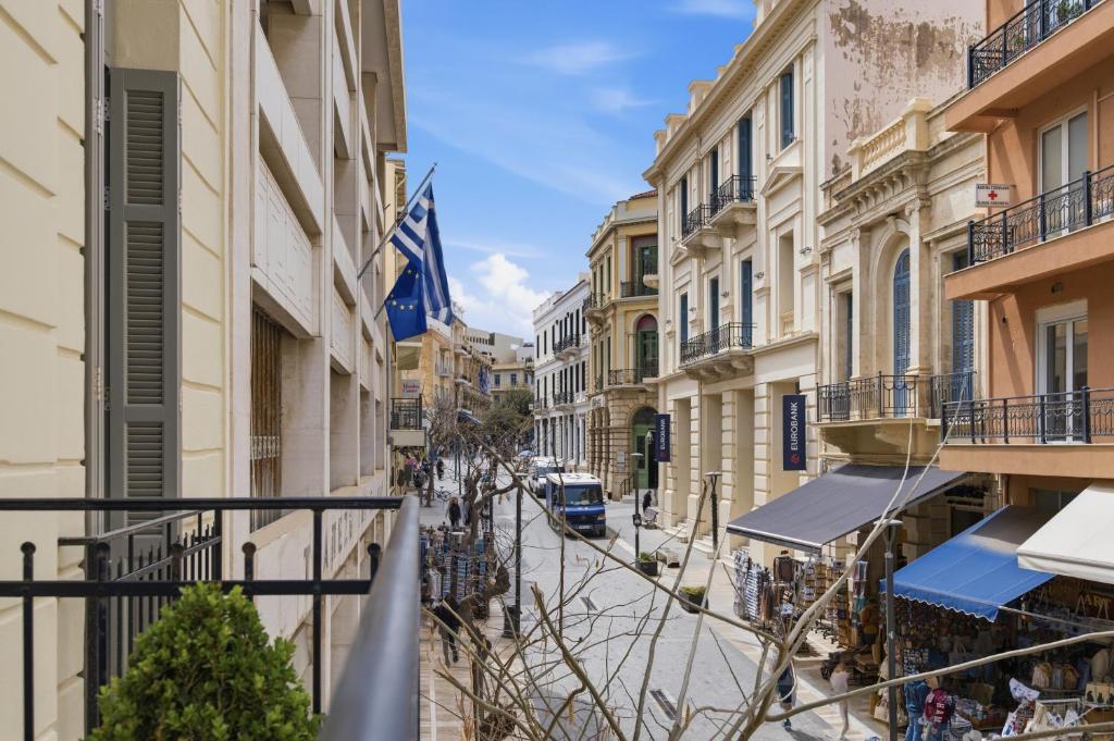 a view of a street in a city with buildings at Hospi Living Empire Suites in Heraklio