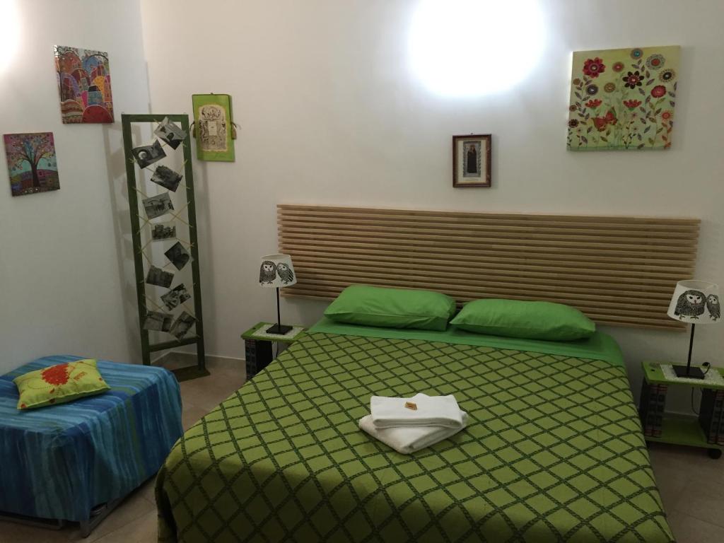 Postel nebo postele na pokoji v ubytování B&B Castello