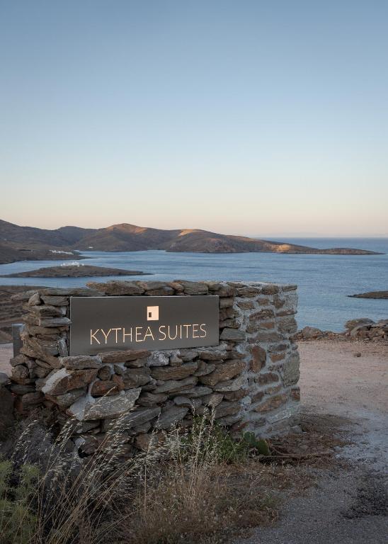 a sign that says ktecera suites on a stone wall at Kythea Suites Kythnos in Kithnos