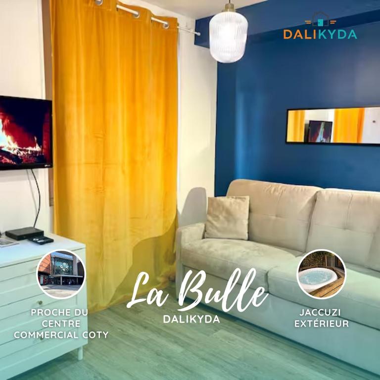 a living room with a couch and a yellow curtain at Dalikyda - La Bulle - Loveroom in Le Havre