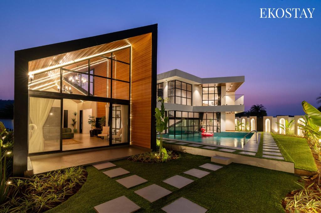 a rendering of a house with a swimming pool at EKOSTAY Luxe - Black Mirror in Igatpuri