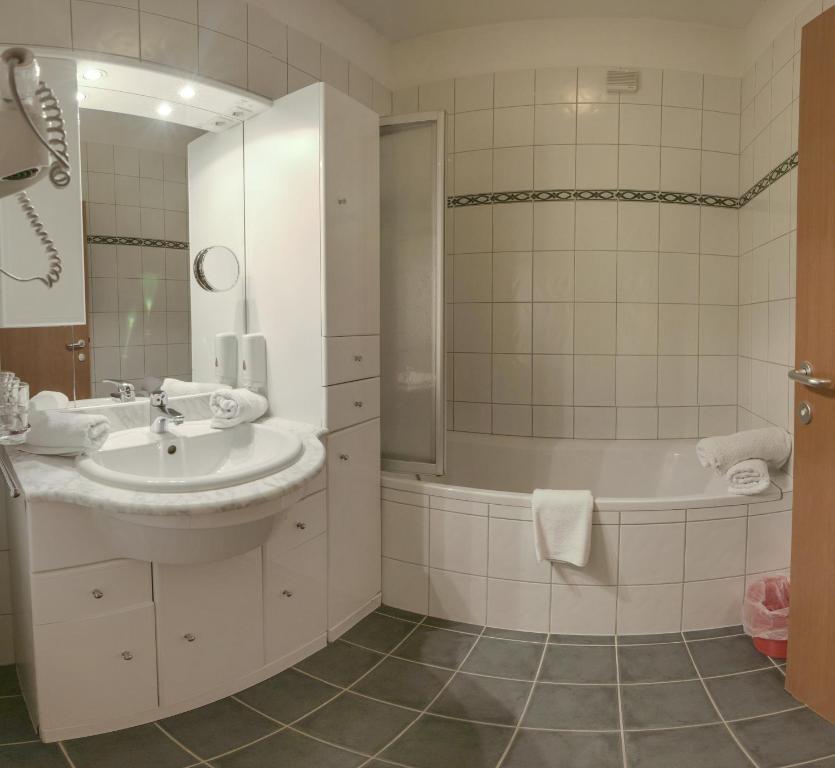 Koupelna v ubytování Hotel Habicht
