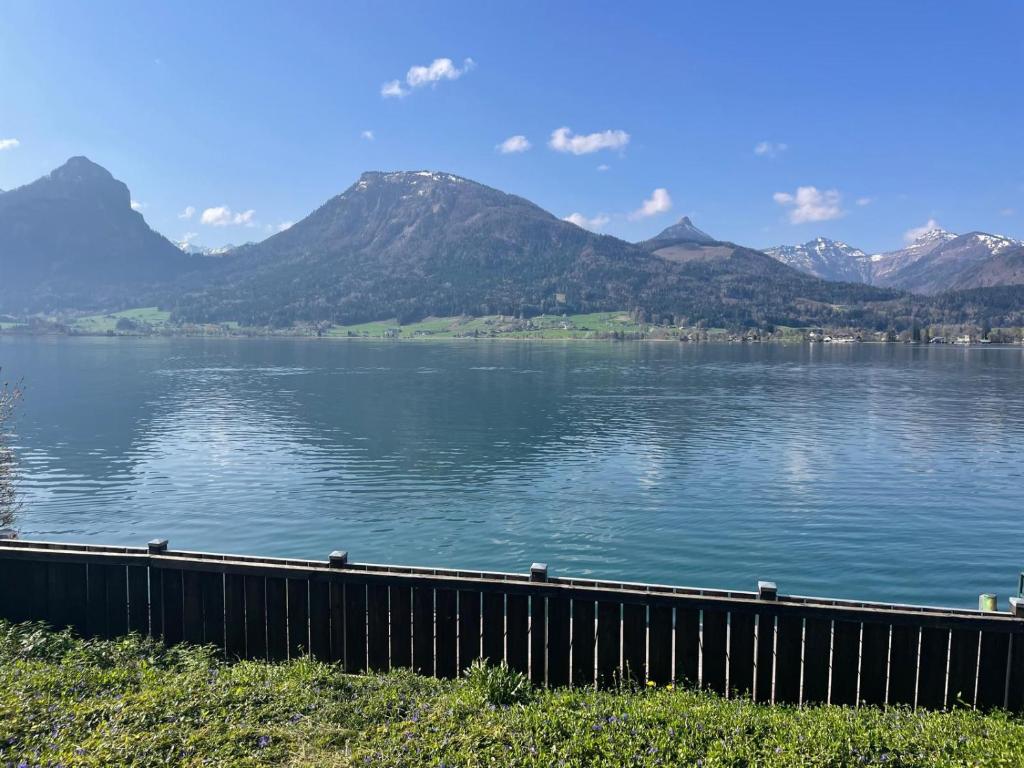 a view of a lake with mountains in the background at Wallner am See in St. Wolfgang