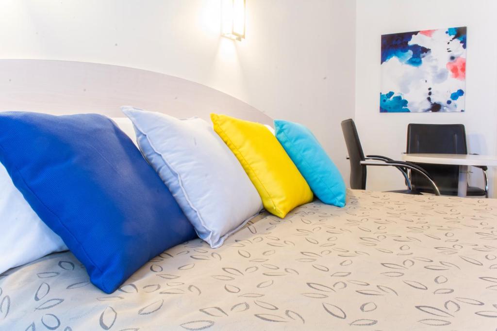 Postel nebo postele na pokoji v ubytování Alexander Motor Inn