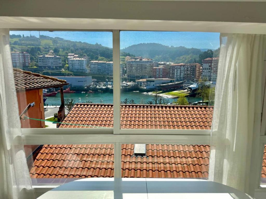 Izaro Home, coqueto piso con vistas al puerto - Appartement De Deux Chambres