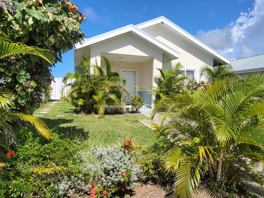 a house with a garden in front of it at Beit Elohim in Lucea