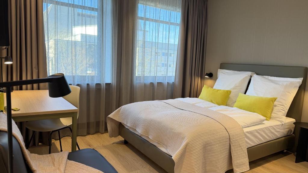 Llit o llits en una habitació de ipartment Koeln Oper @HOME by Best Western