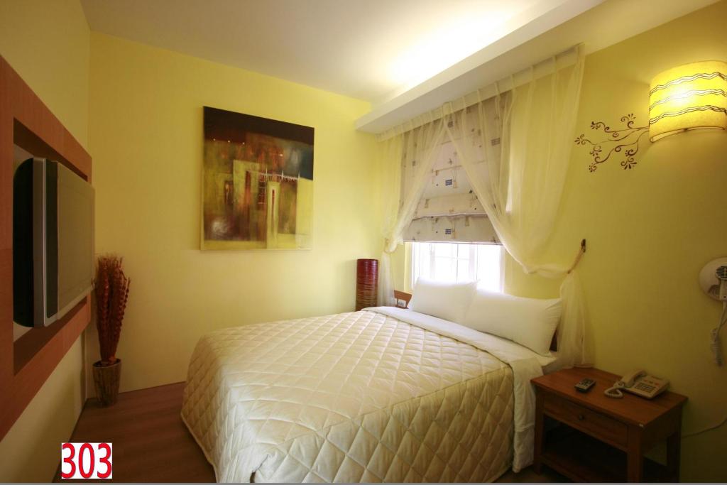 Postel nebo postele na pokoji v ubytování A Cup Hostel